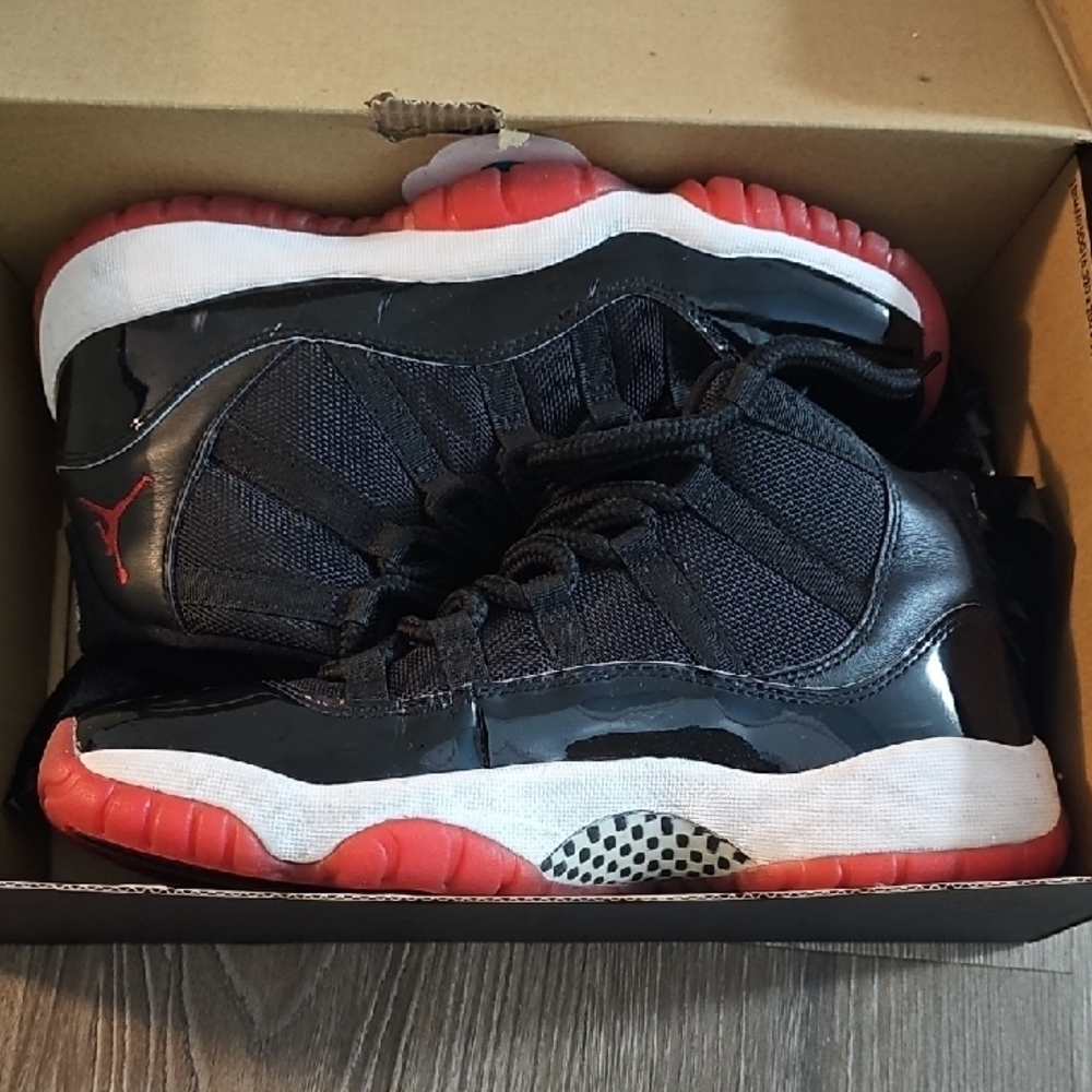 Nike Black and Red Sneakers with High-Top Design